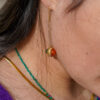 Boucles d’oreilles pendantes en acier inoxydable composées d’un pendentif et de deux jolies perles de soleil verte et orange
