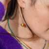 Boucles d’oreilles pendantes en acier inoxydable composées d’un pendentif et de deux jolies perles de soleil verte et orange